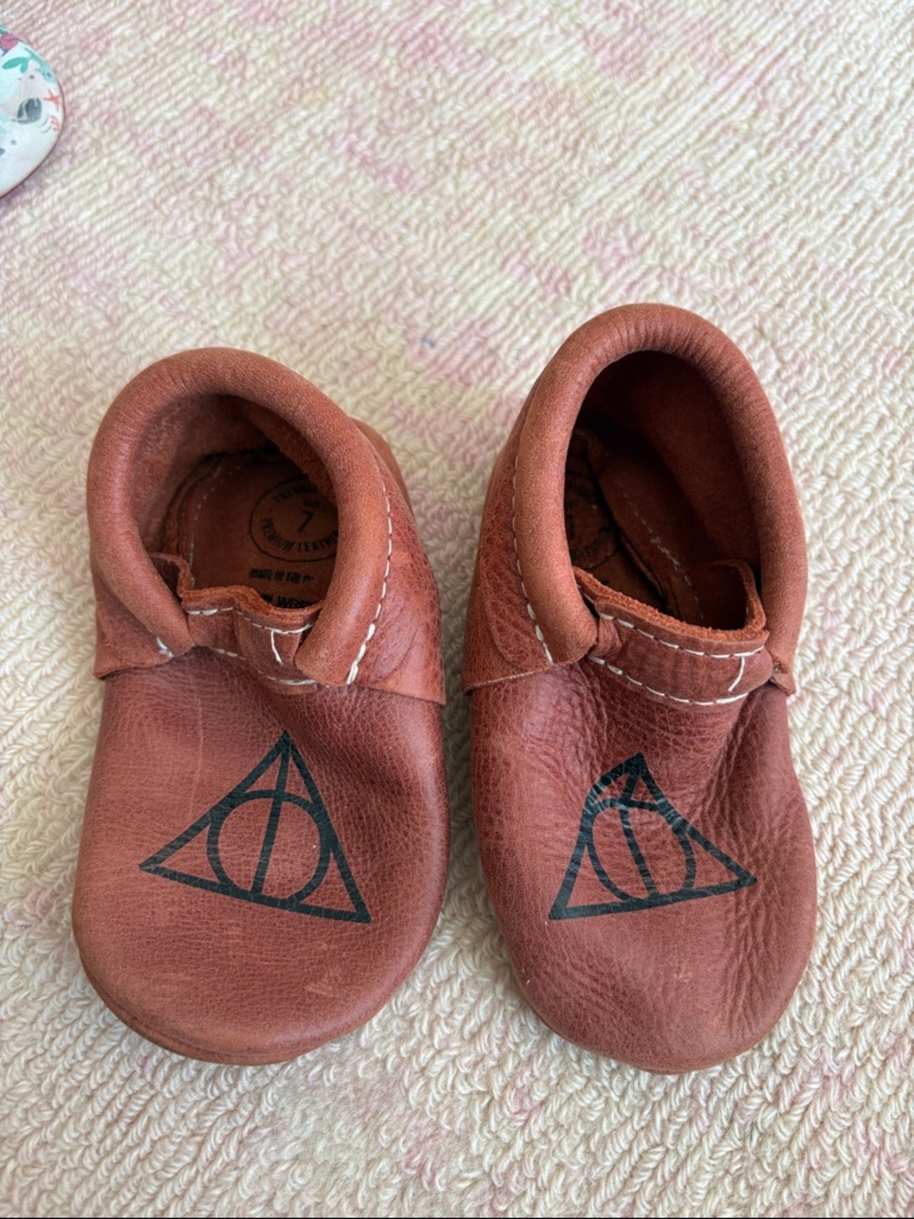 Freshly Picked Brown Leather Baby Moccasins with Black Symbol